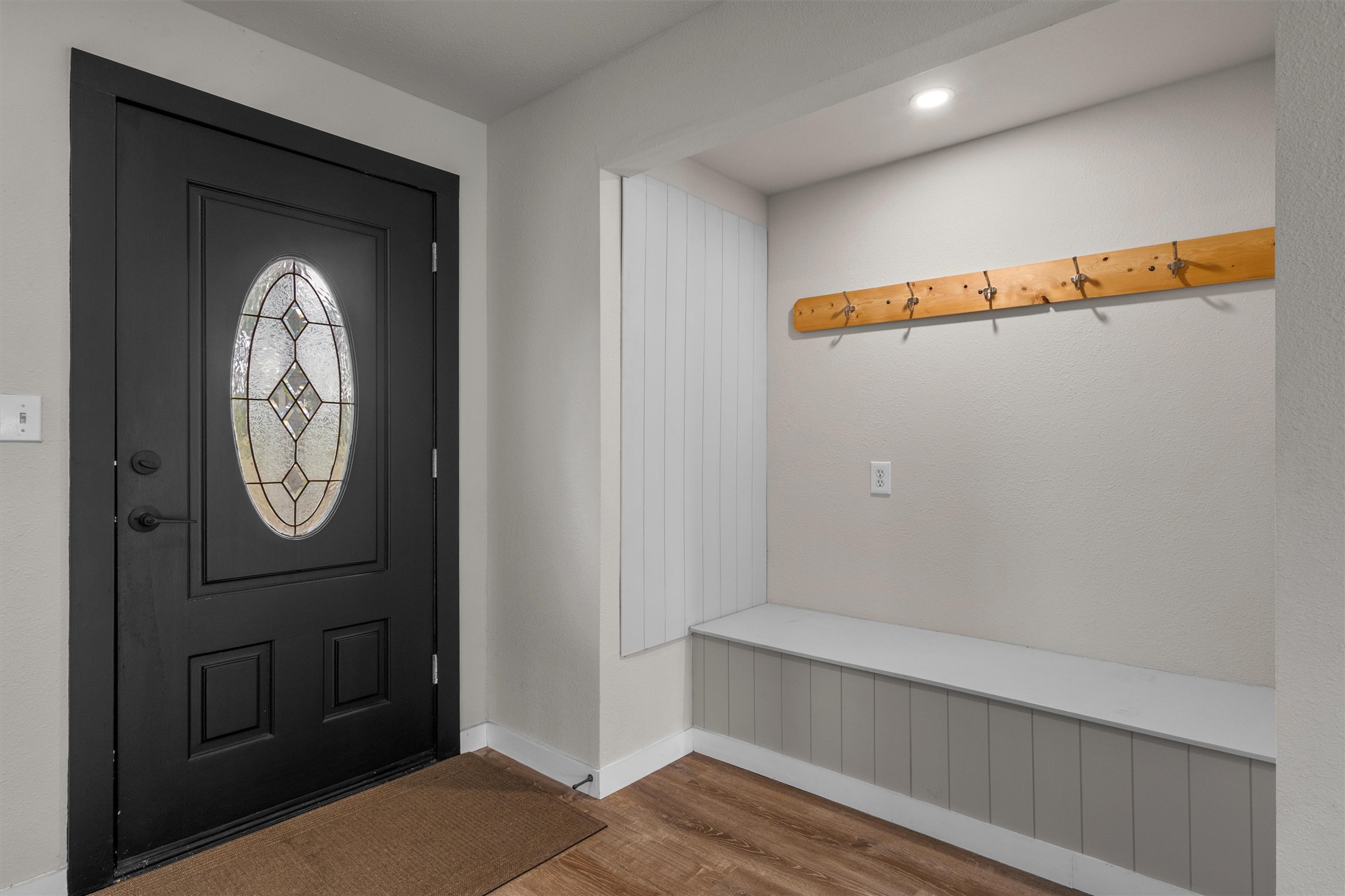 836 Cottle Town Road Smithville, TX 78957 - Photo 9 of 40 Foyer entrance featuring wood finished floors and baseboards
