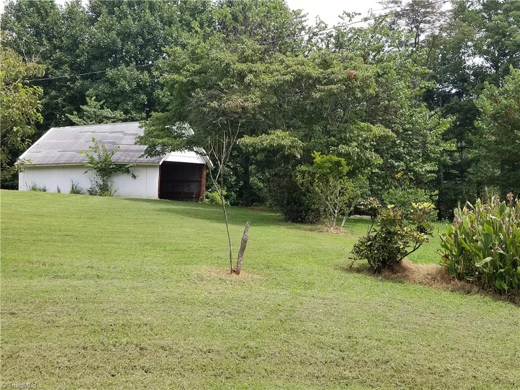 1802 Simmons Road Westfield, NC 27053 - Photo 9 of 29 Side view of storage shed