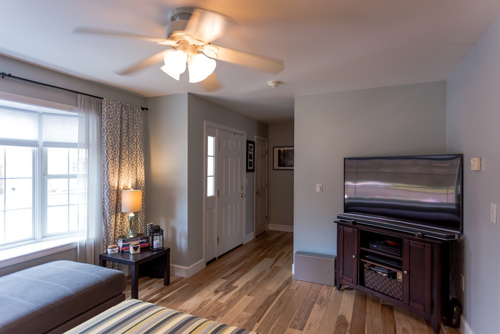 111 Beach Road, Unit 28 Salisbury, MA 01952 - Photo 3 of 14 a bedroom with furniture and a window