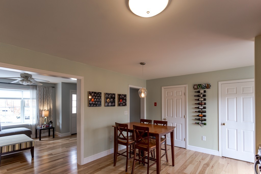 111 Beach Road, Unit 28 Salisbury, MA 01952 - Photo 6 of 14 a view of a livingroom with furniture and wooden floor