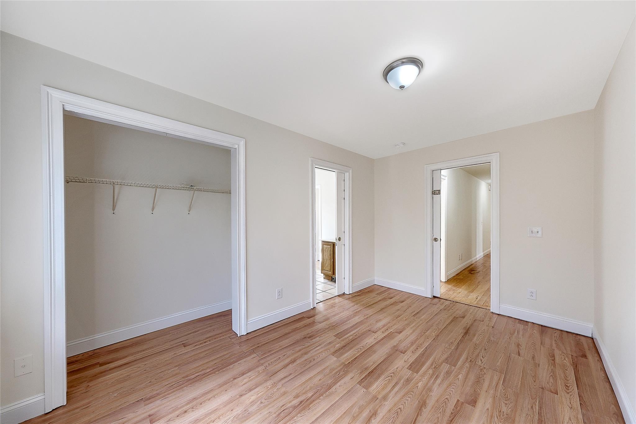 115 E Road Wurtsboro, NY 12790 - Photo 17 of 33 a view of an empty room with wooden floor