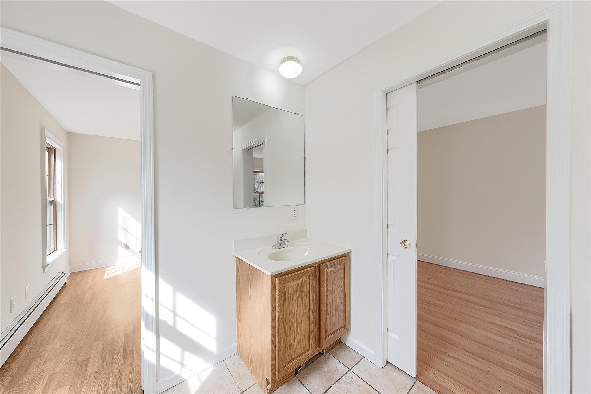 115 E Road Wurtsboro, NY 12790 - Photo 19 of 33 a bathroom with a sink and a mirror