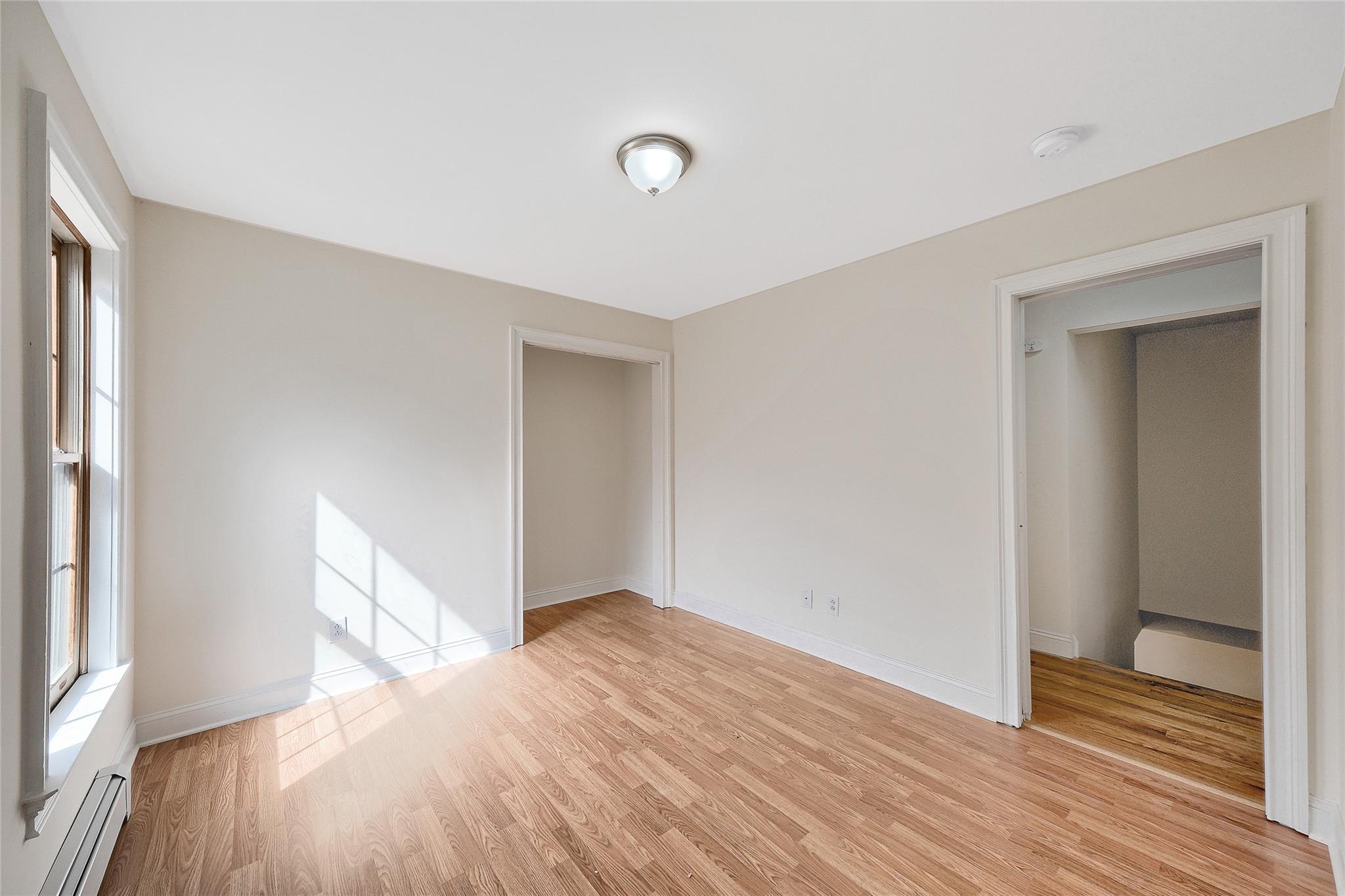 115 E Road Wurtsboro, NY 12790 - Photo 20 of 33 a view of empty room with wooden floor