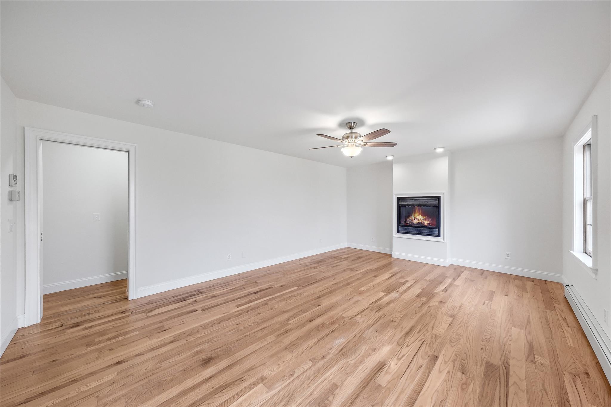 115 E Road Wurtsboro, NY 12790 - Photo 22 of 33 a view of empty room with wooden floor