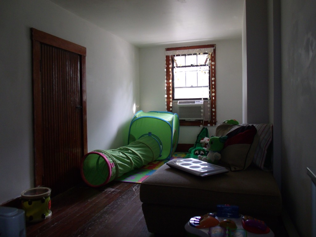 115-119 Springfield Street Three Rivers, MA 01080 - Photo 29 of 30 a living room with furniture rug and a window
