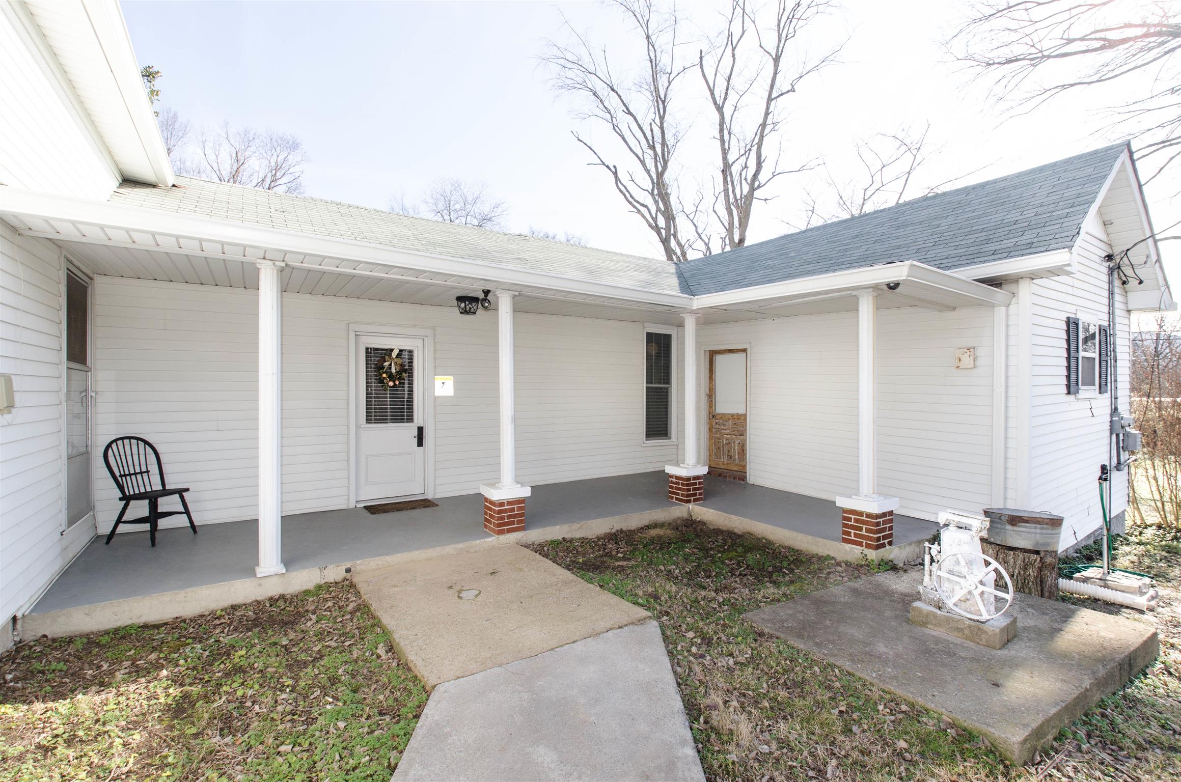 4 Rome First Street Lebanon, TN 37087 - Photo 7 of 25 a backyard of a house with table and chairs