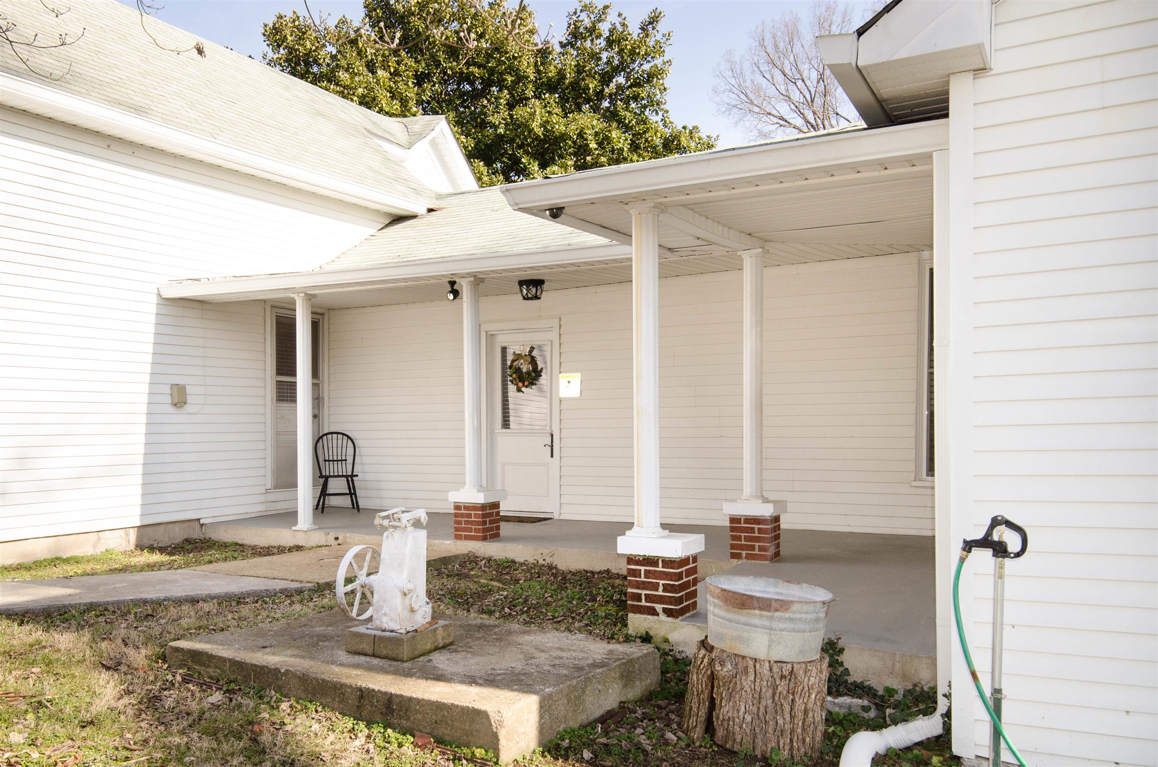 4 Rome First Street Lebanon, TN 37087 - Photo 8 of 25 a front view of a house with outdoor seating