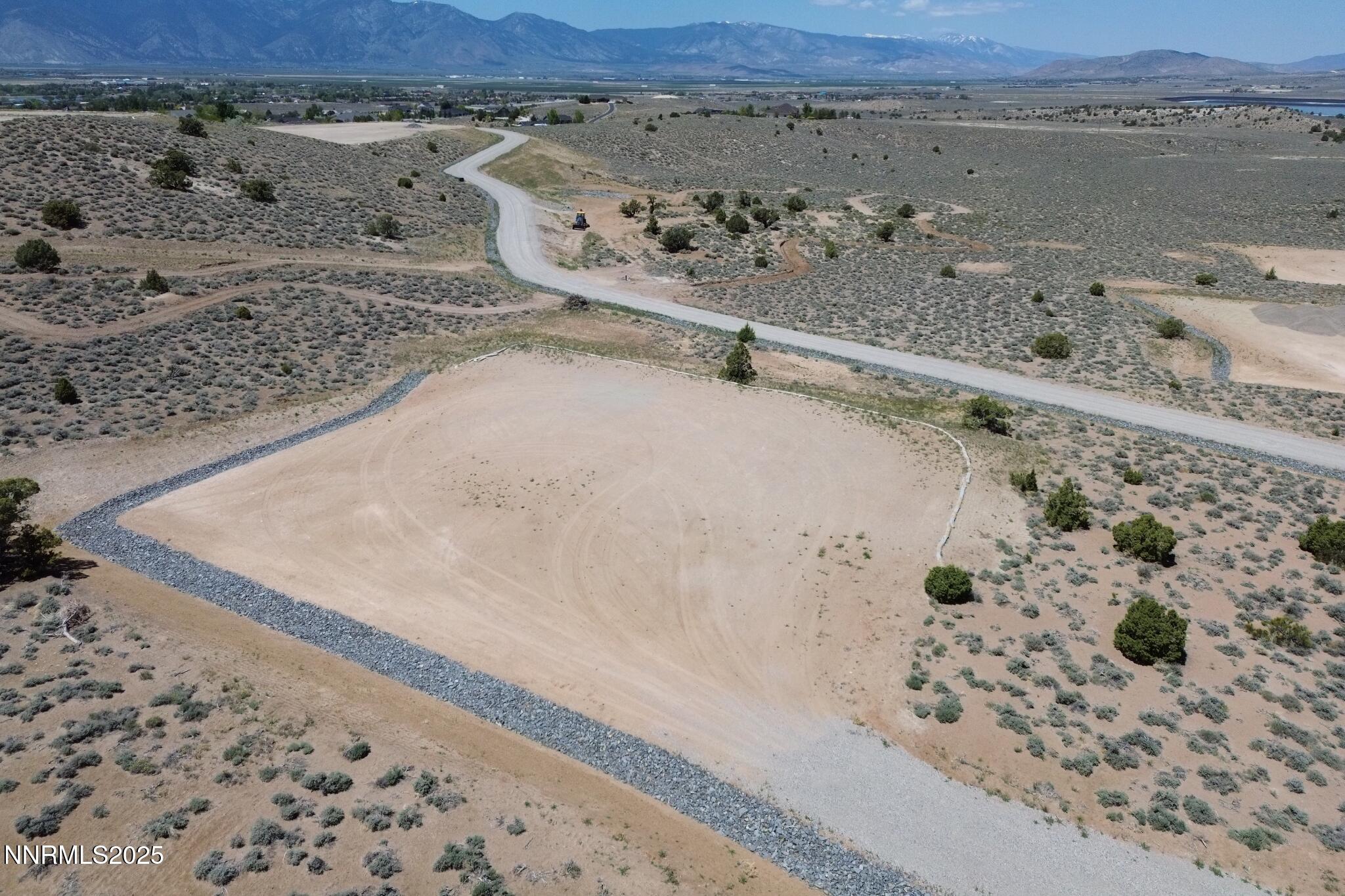 2012 Currant Court, Unit 4 Gardnerville, NV 89410 - Photo 2 of 5 a view of a bathtub in a dry field