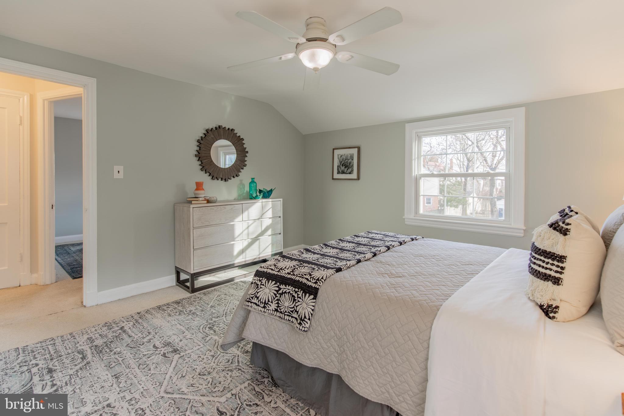502 East Schuyler Road Silver Spring, MD 20901 - Photo 17 of 29 a bedroom with a bed and a window