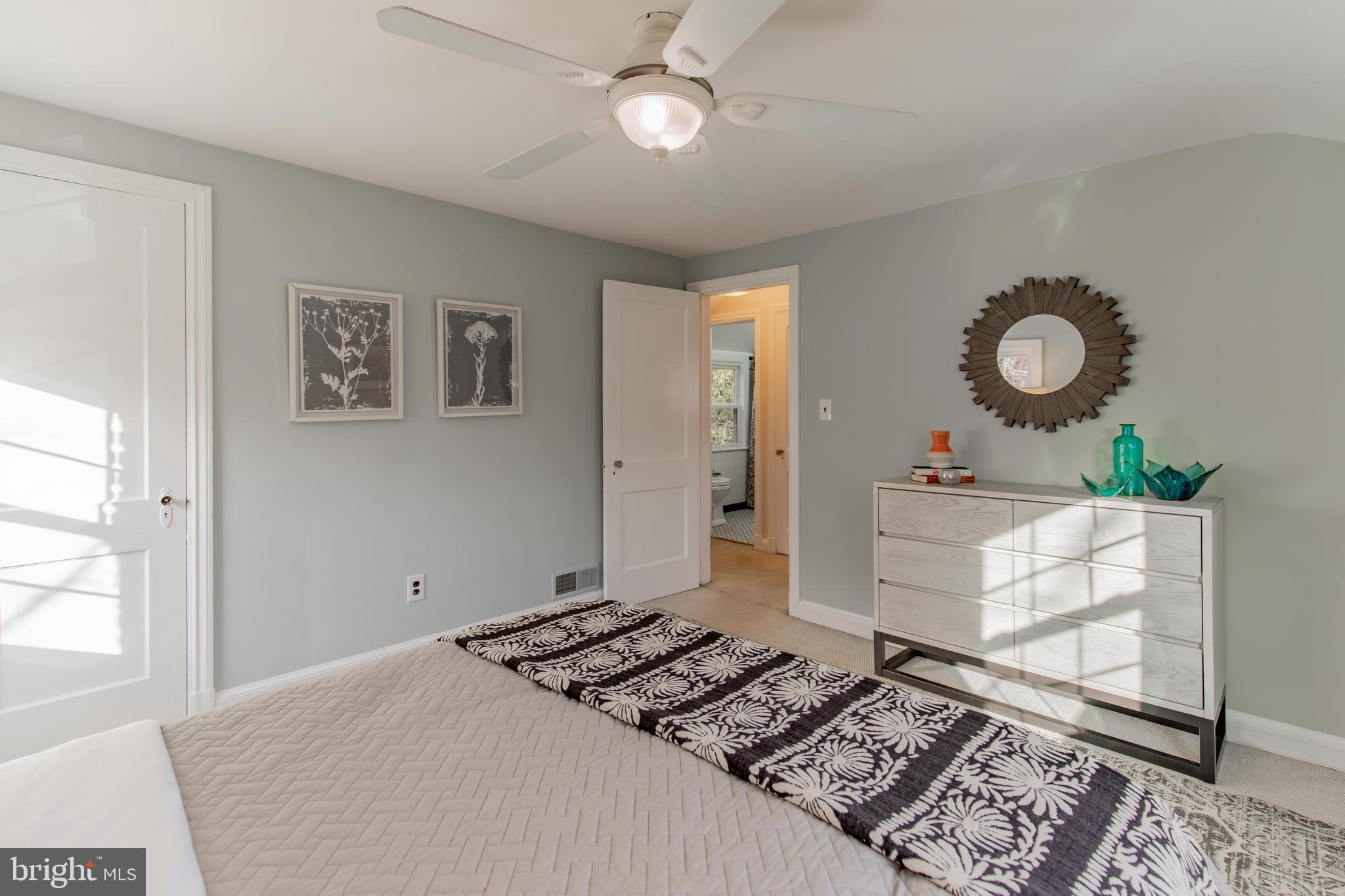 502 East Schuyler Road Silver Spring, MD 20901 - Photo 18 of 29 a bedroom with bed and a window