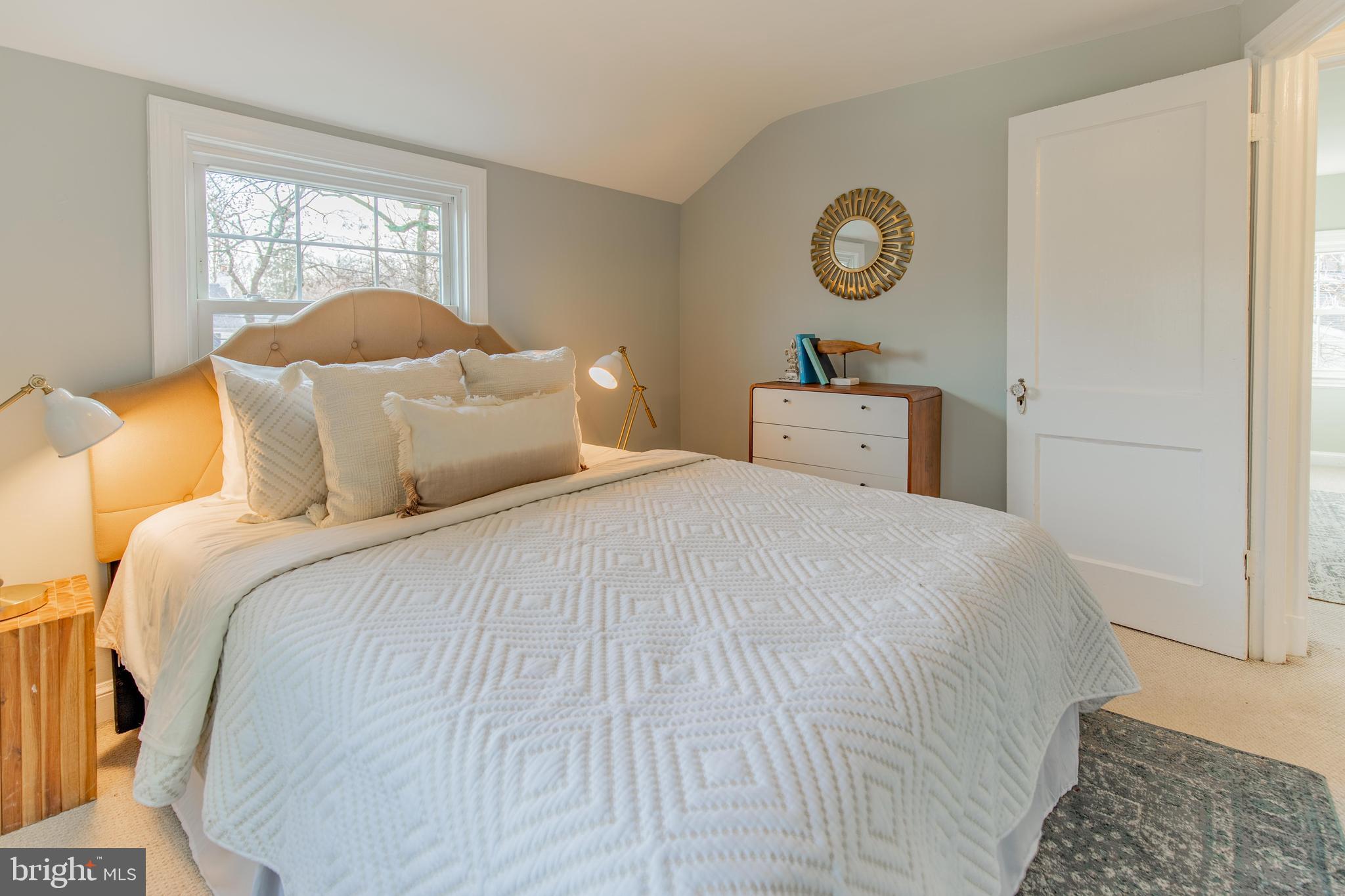 502 East Schuyler Road Silver Spring, MD 20901 - Photo 19 of 29 a bedroom with a bed and a window