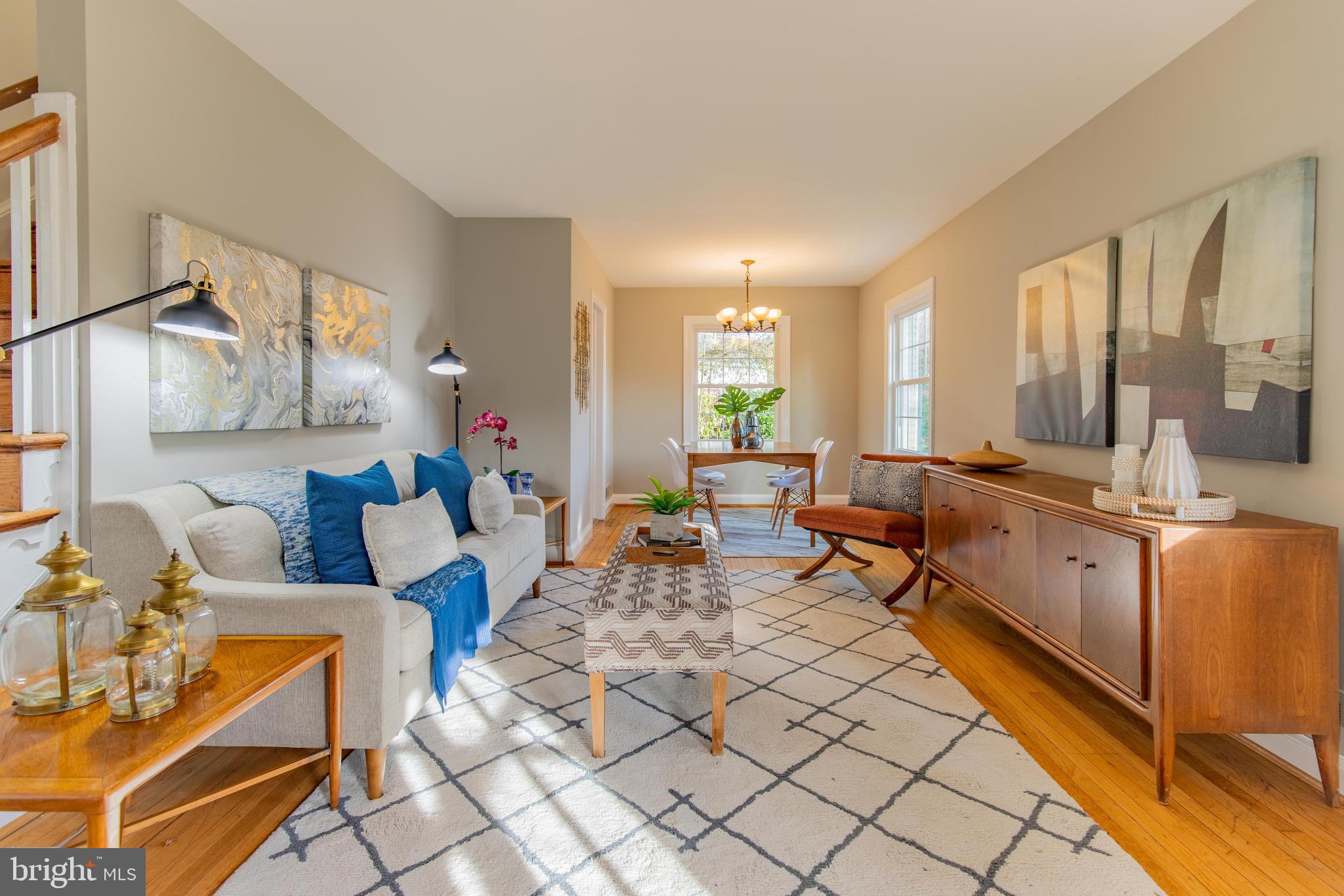 502 East Schuyler Road Silver Spring, MD 20901 - Photo 3 of 29 a living room with furniture and a table