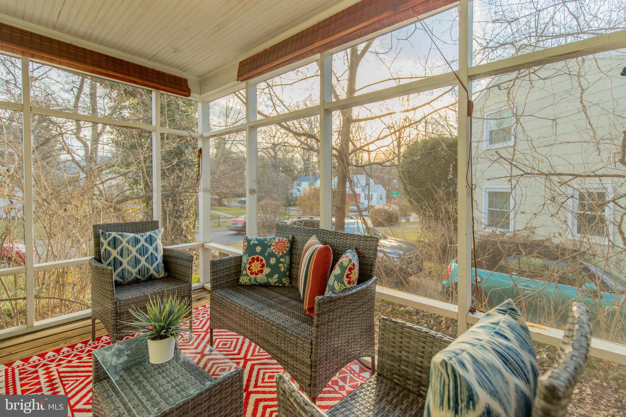 502 East Schuyler Road Silver Spring, MD 20901 - Photo 24 of 29 a living room with furniture and a floor to ceiling window
