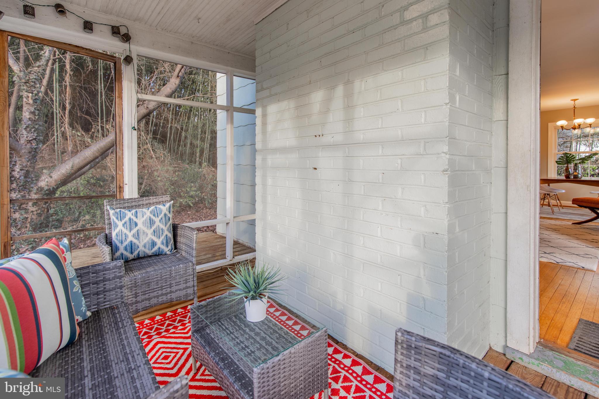502 East Schuyler Road Silver Spring, MD 20901 - Photo 26 of 29 a living room with a couch and a table