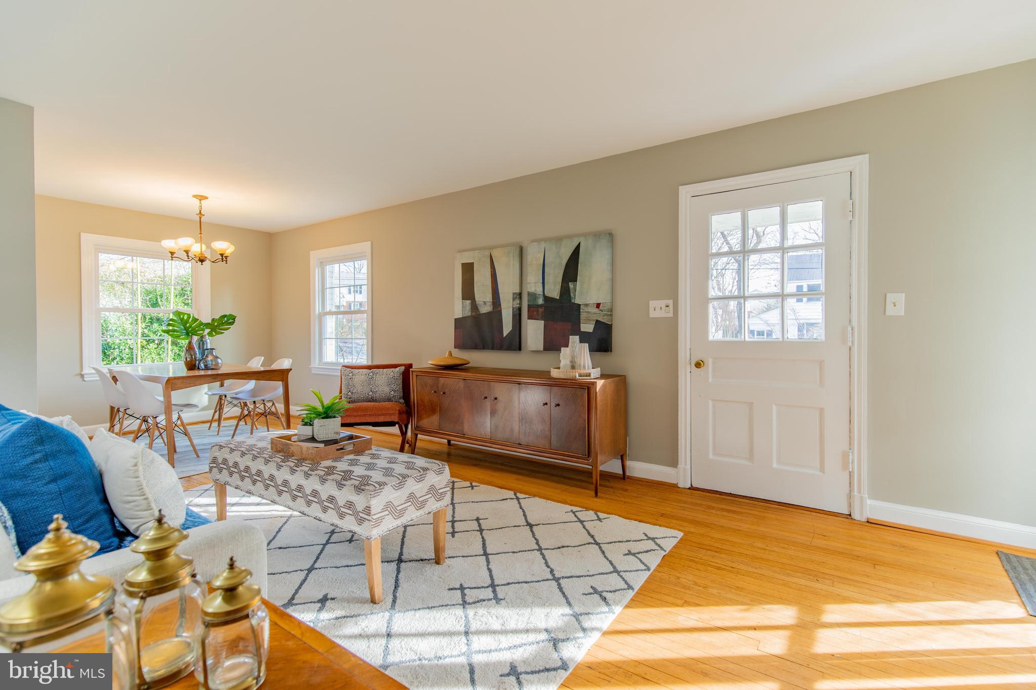 502 East Schuyler Road Silver Spring, MD 20901 - Photo 4 of 29 a living room with furniture and a table