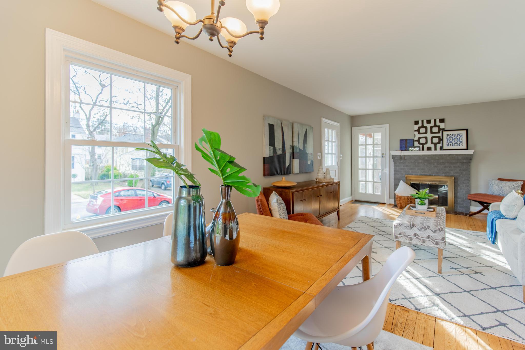 502 East Schuyler Road Silver Spring, MD 20901 - Photo 9 of 29 a living room with furniture a window and a flat screen tv