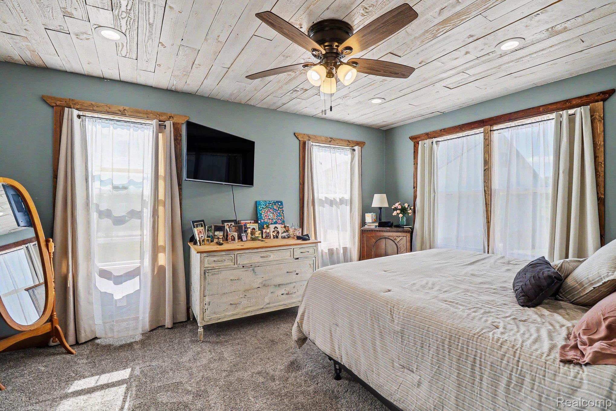 2150 East Snover Road Mayville, MI 48744 - Photo 19 of 48 Bedroom featuring a wood-plank ceiling with recessed lighting and a ceiling fan
