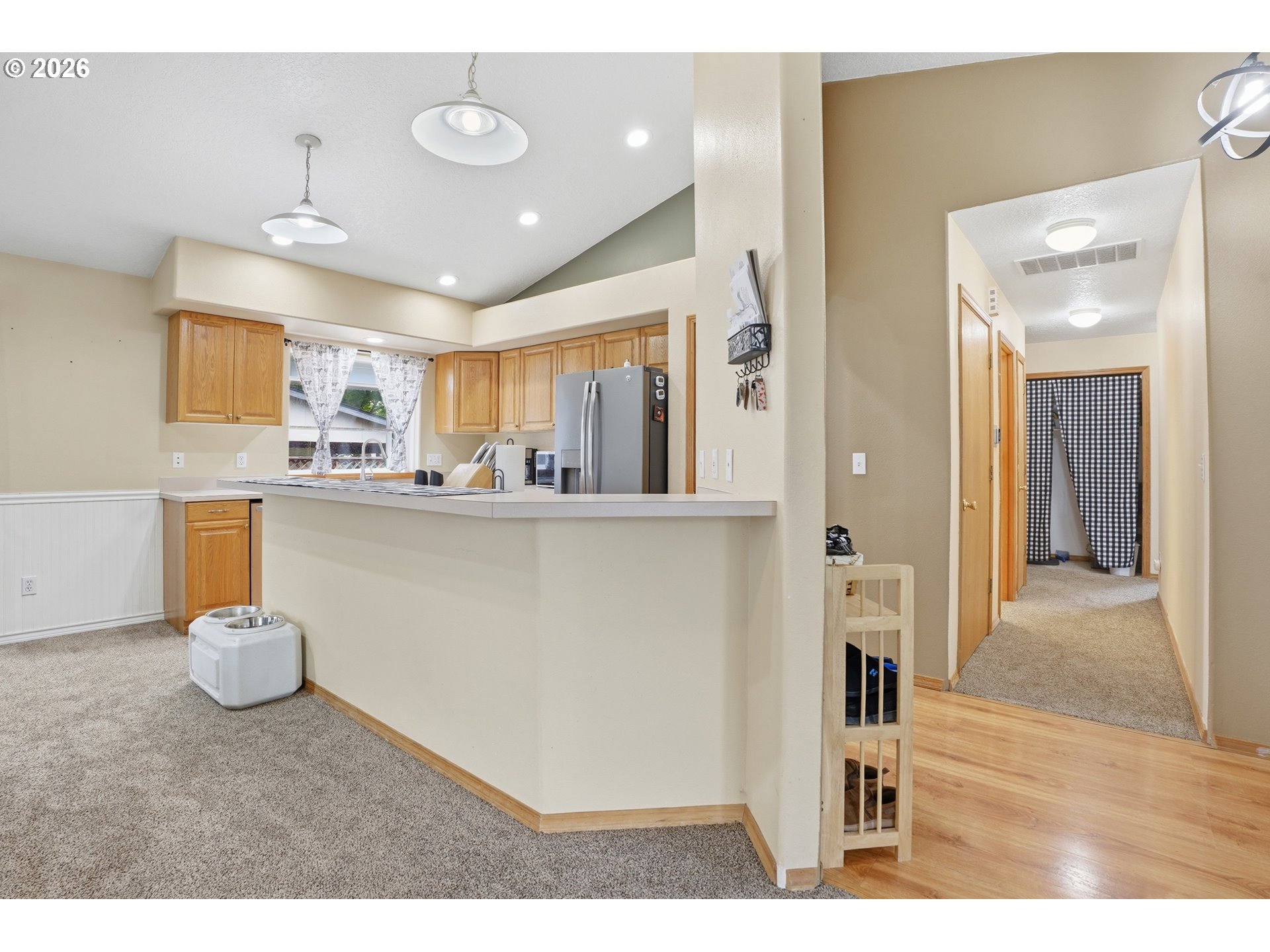 105 Toliver Road Molalla, OR 97038 - Photo 13 of 34 a kitchen with kitchen island a sink stainless steel appliances and cabinets