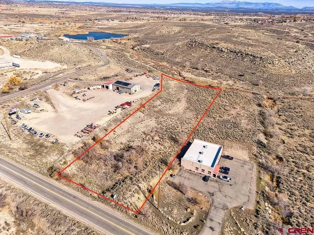 a view of a yard with a mountain