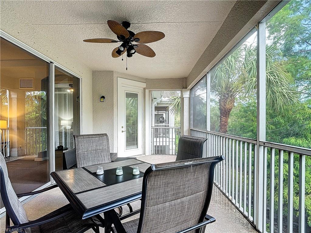 12854 Carrington Circle, Unit 204 Naples, FL 34105 - Photo 24 of 37 a living room with furniture and a window