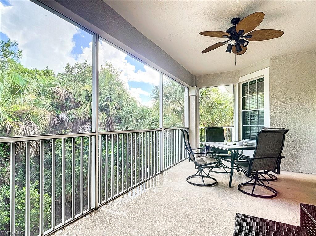 12854 Carrington Circle, Unit 204 Naples, FL 34105 - Photo 25 of 37 a view of a workspace with furniture and a window