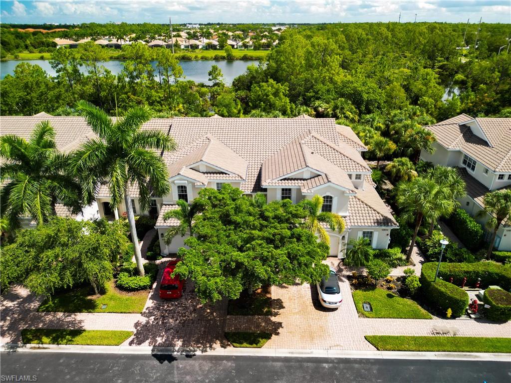 12854 Carrington Circle, Unit 204 Naples, FL 34105 - Photo 29 of 37 a view of a garden with plants