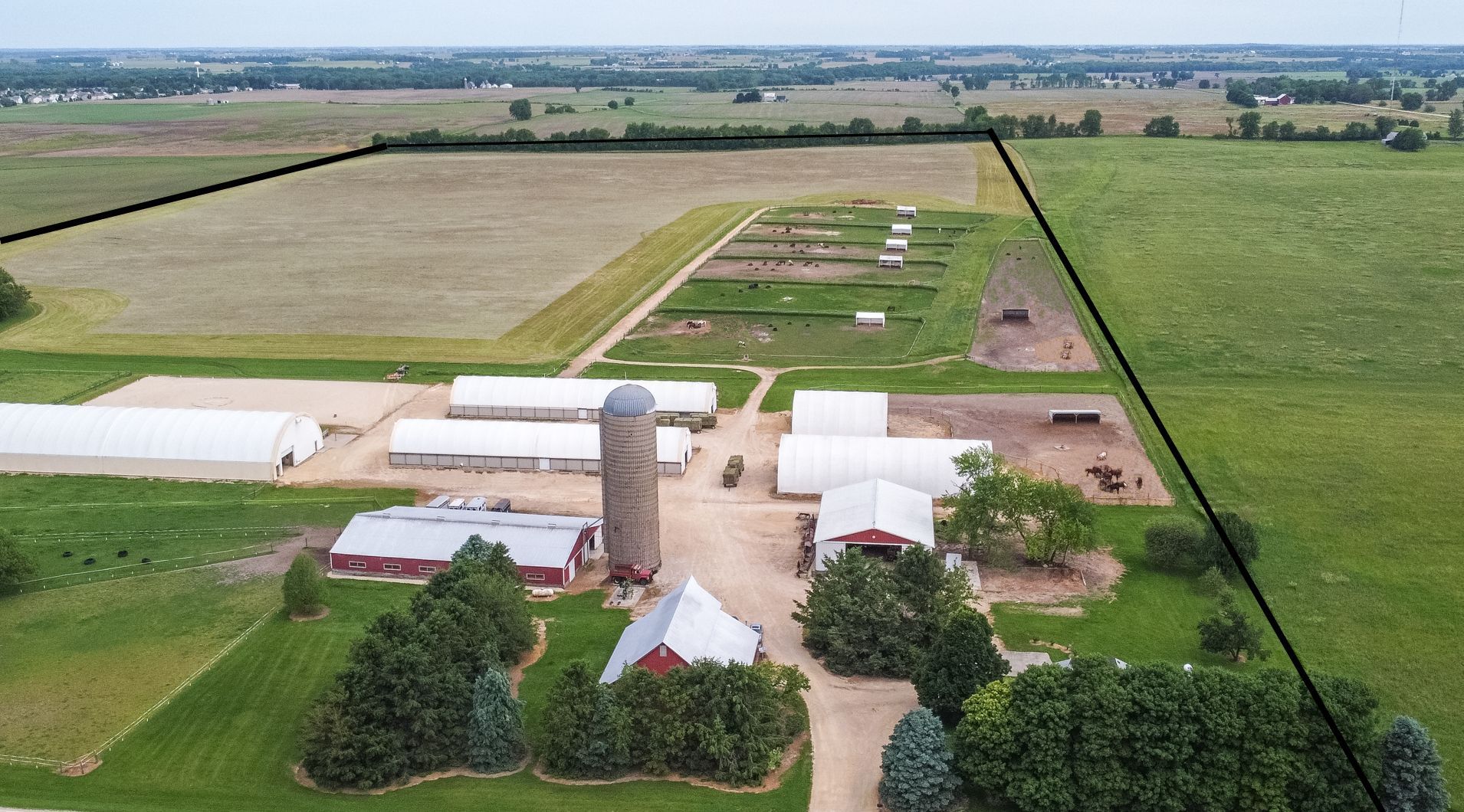 6135 Base Line Road Kirkland, IL 60146 - Photo 1 of 48 a aerial view of a city
