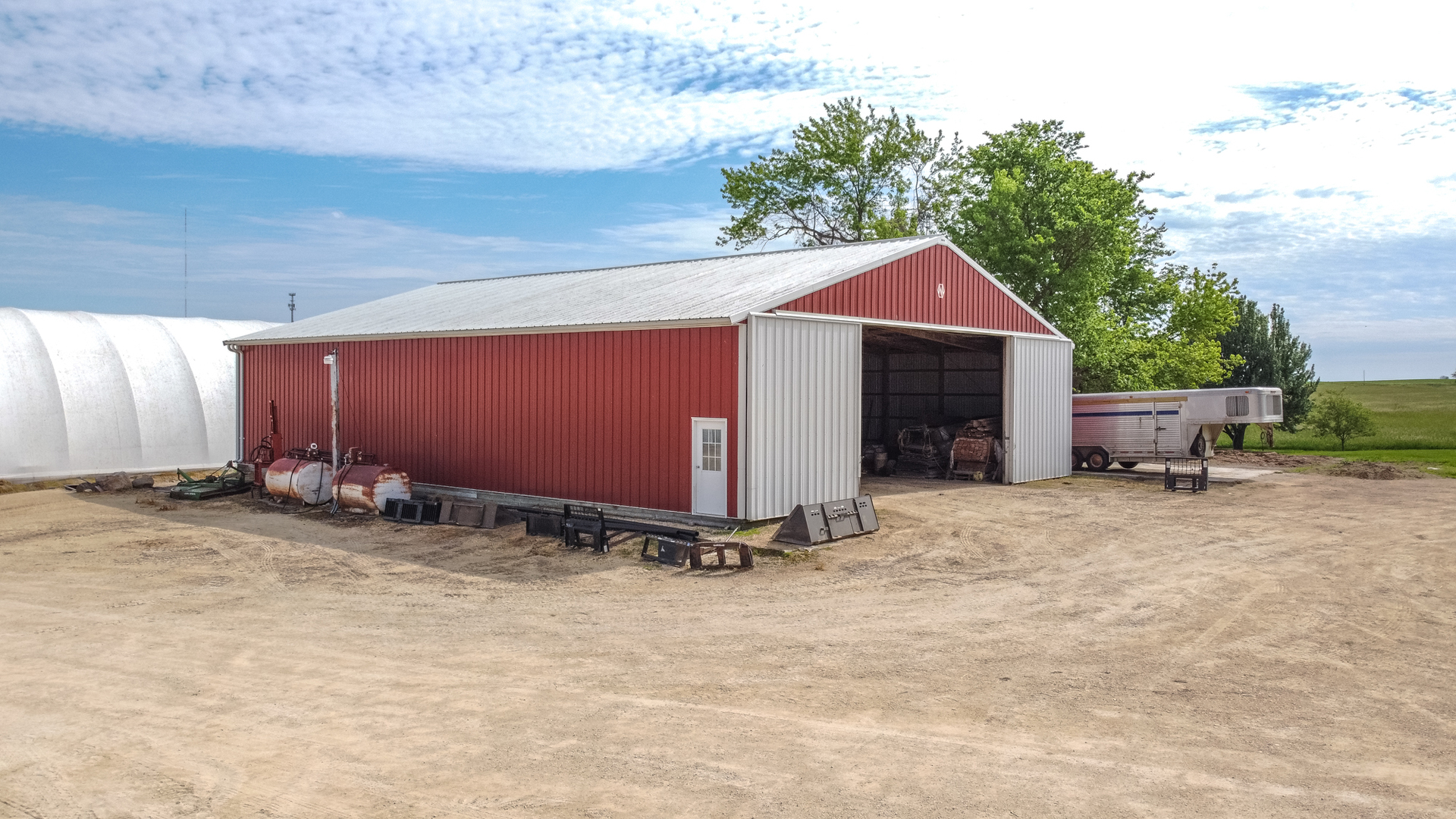 6135 Base Line Road Kirkland, IL 60146 - Photo 26 of 48 a view of a barn in front of a house