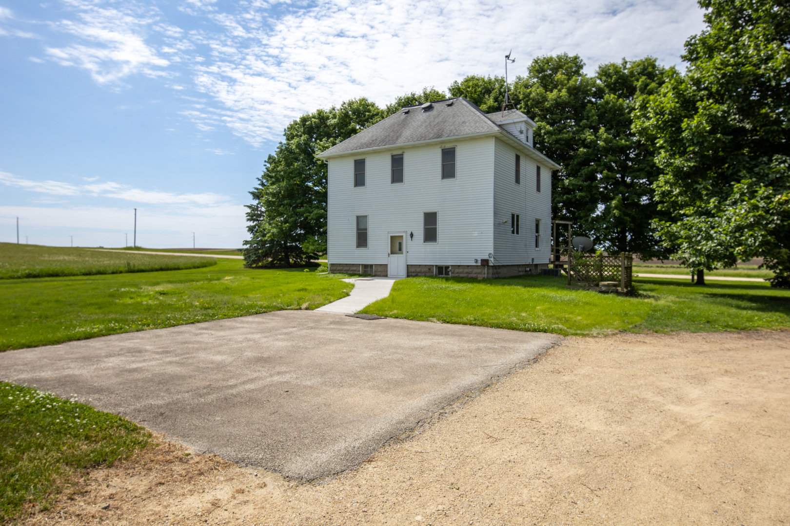 6135 Base Line Road Kirkland, IL 60146 - Photo 29 of 48 a view of a house with a yard