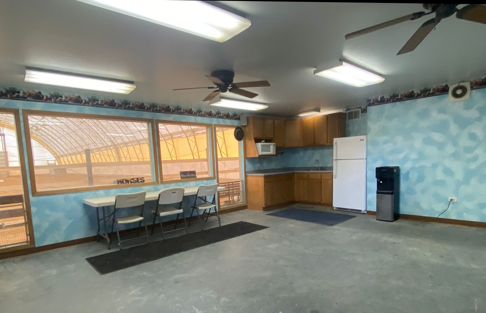 6135 Base Line Road Kirkland, IL 60146 - Photo 5 of 48 a living room with fireplace furniture and a large window