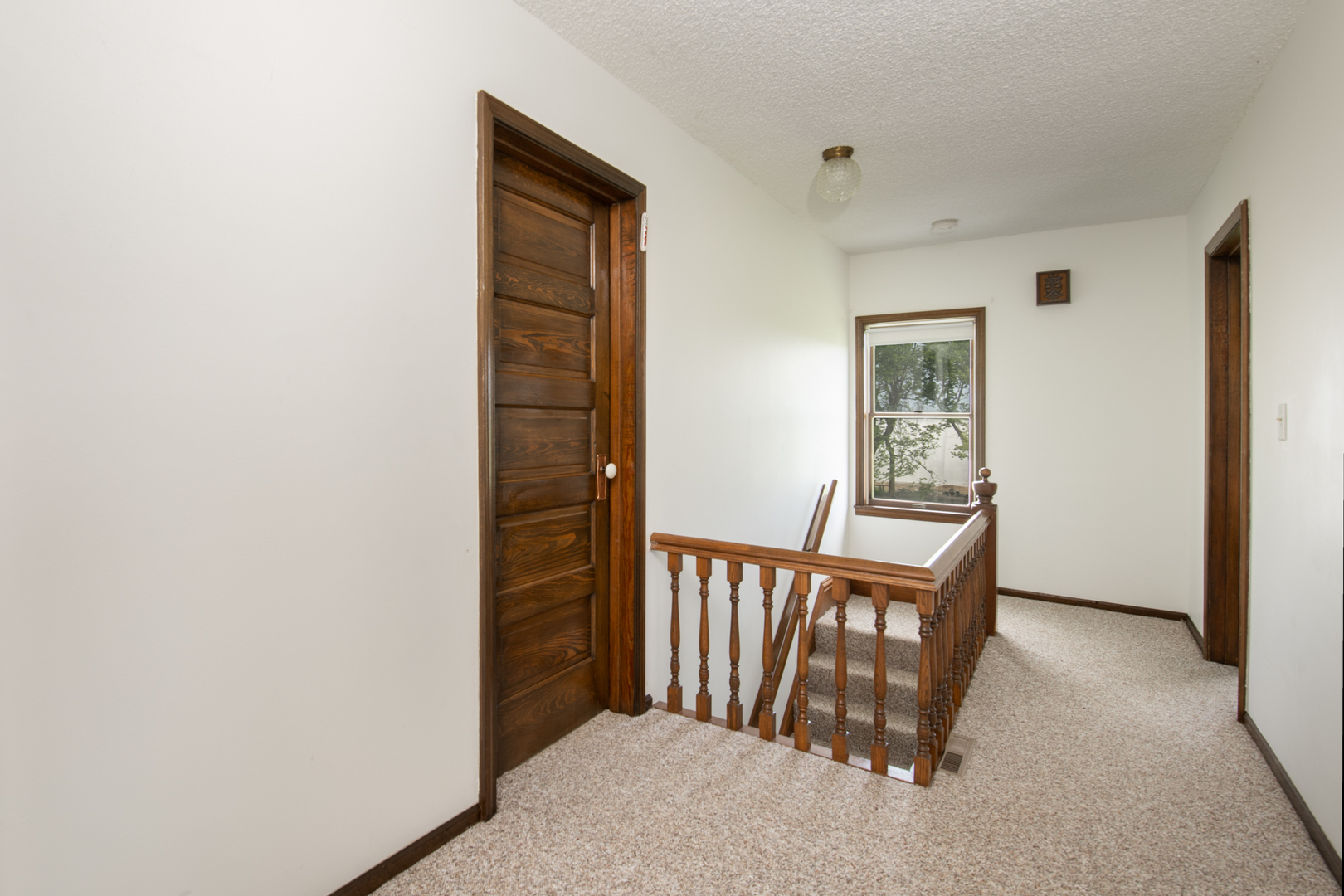 6135 Base Line Road Kirkland, IL 60146 - Photo 41 of 48 a view of a hallway with windows