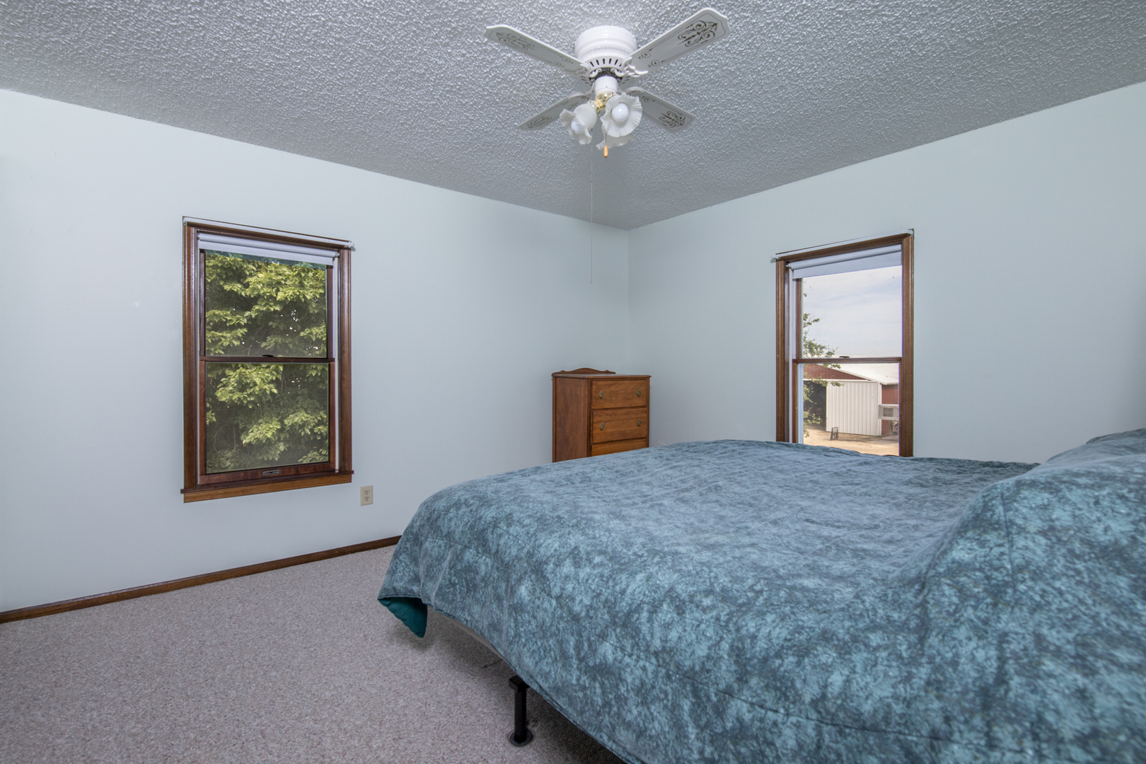 6135 Base Line Road Kirkland, IL 60146 - Photo 42 of 48 a bedroom with a bed and a window