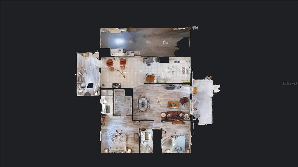 8592 Southwest 91 Street, Unit E Ocala, FL 34481 - Photo 20 of 20 a bed room with a stove and a table