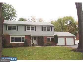 62 Bayberry Road Ewing, NJ 08618 - Photo 1 of 11 a front view of a house with a garden