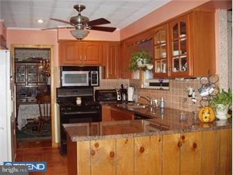 62 Bayberry Road Ewing, NJ 08618 - Photo 2 of 11 a kitchen with stainless steel appliances granite countertop a stove and a refrigerator