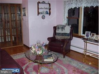 62 Bayberry Road Ewing, NJ 08618 - Photo 6 of 11 a living room with furniture and a fireplace