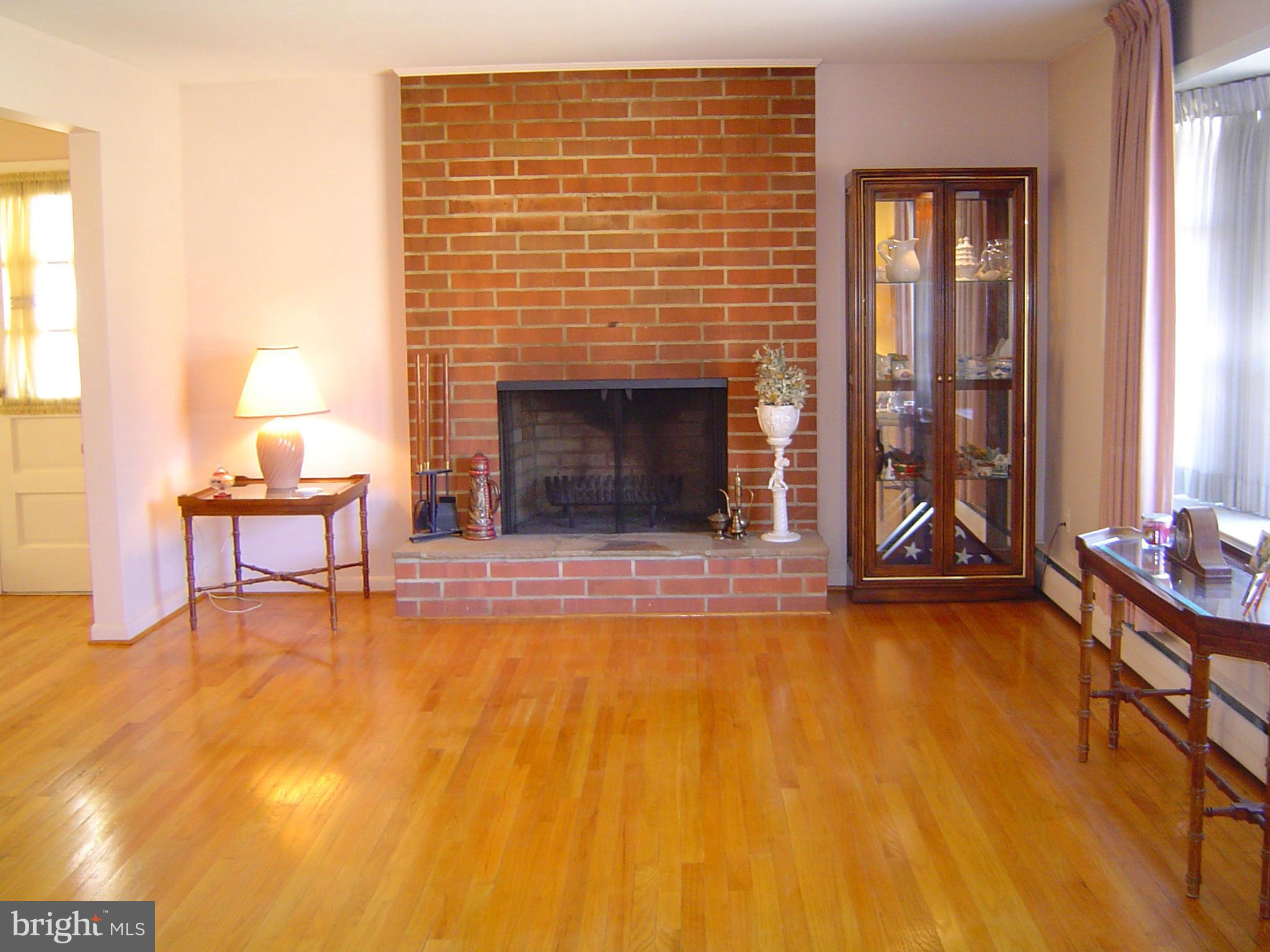 2537 Melba Road Ellicott City, MD 21042 - Photo 8 of 30 Living Room w/Brick Fireplace and Stone Hearth