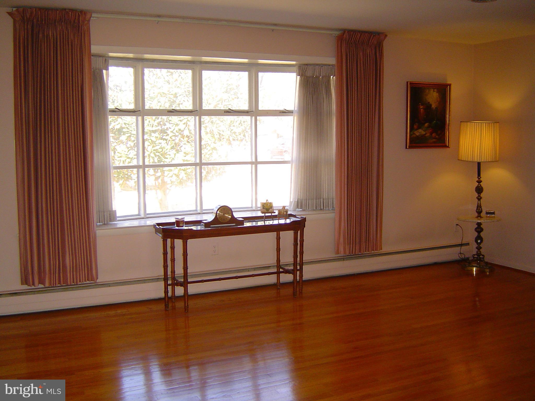 2537 Melba Road Ellicott City, MD 21042 - Photo 9 of 30 Living Room w/Bow Window View of Magnolia Tree
