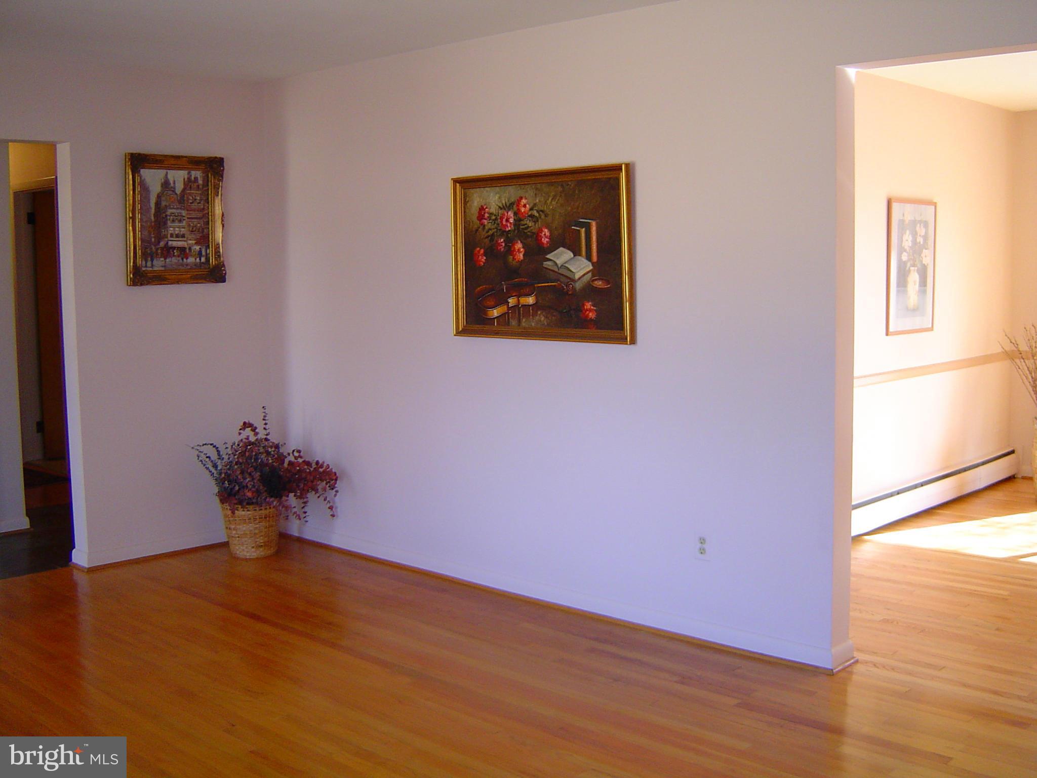 2537 Melba Road Ellicott City, MD 21042 - Photo 10 of 30 Living Room & Dining Room w/Gleaming Hardwoods