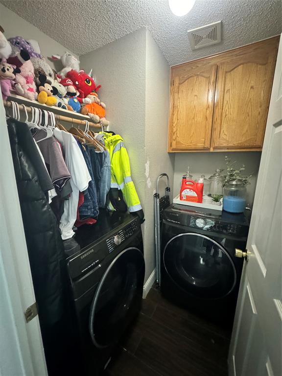 6717 Trumpet Drive Rowlett, TX 75089 - Photo 10 of 12 a utility room with dryer and washer