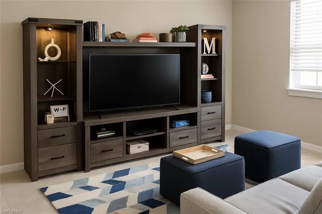 a living room with furniture and a flat screen tv
