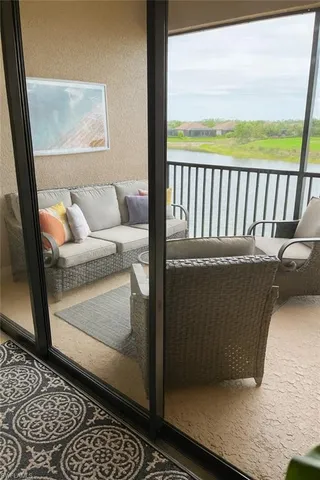 a view of a two chair in the balcony