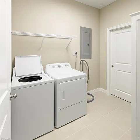 a view of a yard with plants and trees