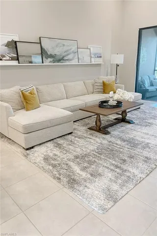 a living room with furniture and a couch