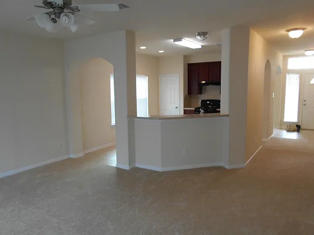 a view of a kitchen and a window