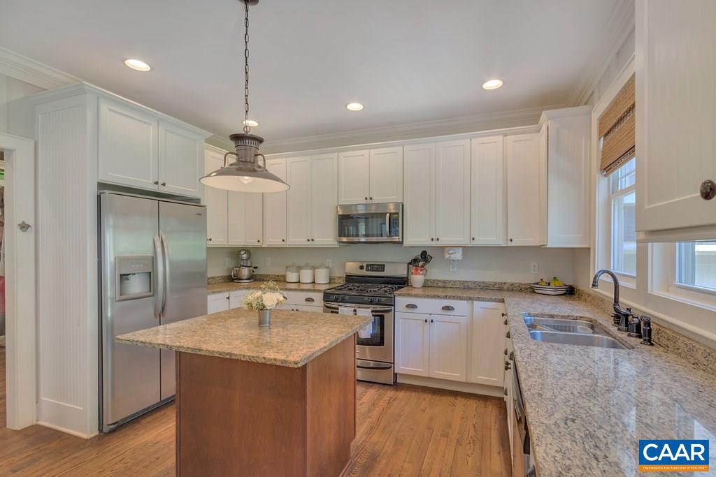 831 Village Road Charlottesville, VA 22903 - Photo 15 of 43 a kitchen with stainless steel appliances granite countertop a sink stove and refrigerator