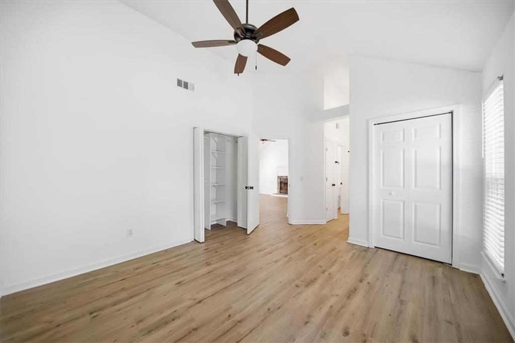 8068 Whitney Court Canton, GA 30115 - Photo 20 of 32 a view of empty room with wooden floor