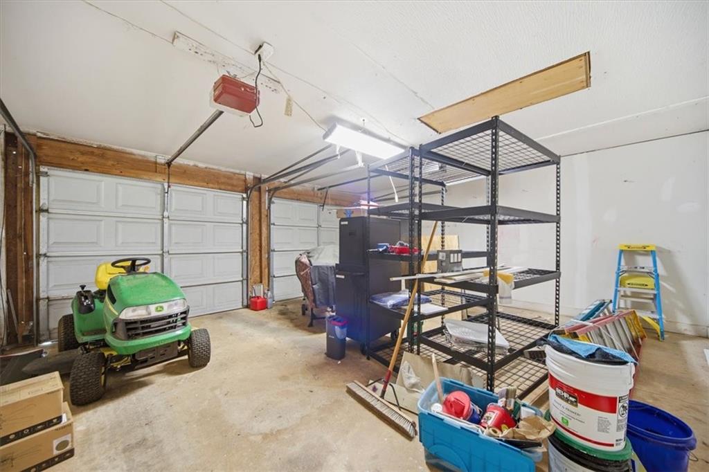 8068 Whitney Court Canton, GA 30115 - Photo 26 of 32 a storage room with furniture
