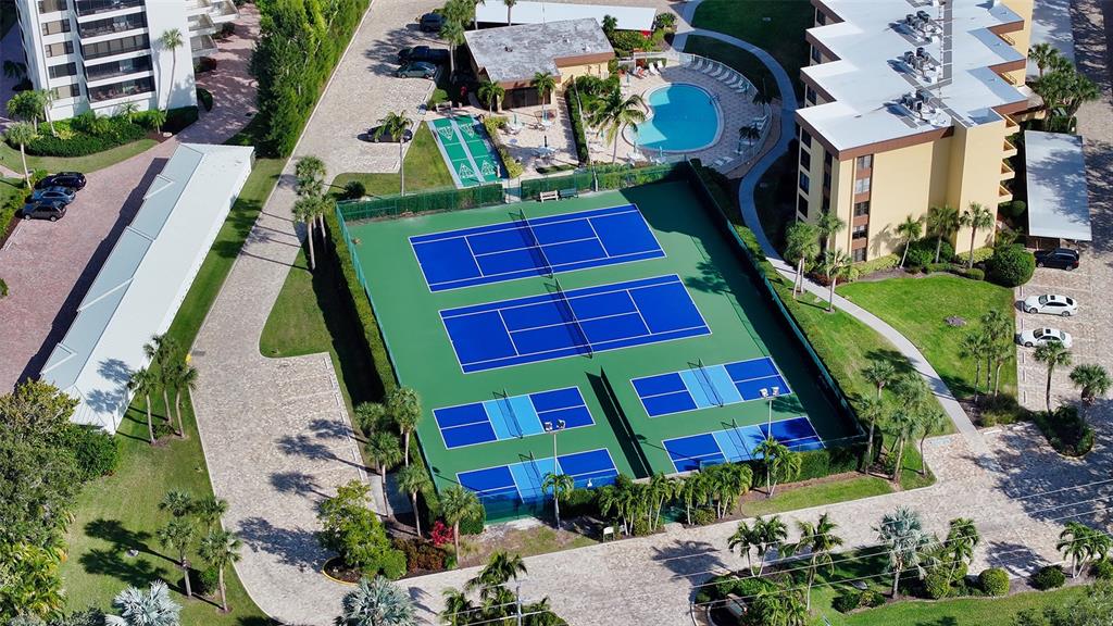 8764 Midnight Pass Road, Unit A306 Sarasota, FL 34242 - Photo 15 of 53 an aerial view of a yard