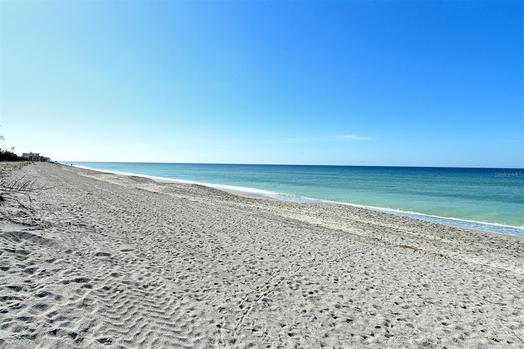 8764 Midnight Pass Road, Unit A306 Sarasota, FL 34242 - Photo 26 of 53 a view of an ocean beach